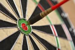 bigstock-Dartboard-with-dart-on-bullsey-61017551